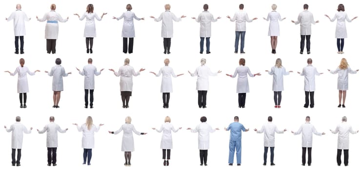 group of doctors standing with their backs isolated on white background