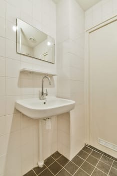 a bathroom with a sink and mirror on the wall next to a shower stall in a door is behind it