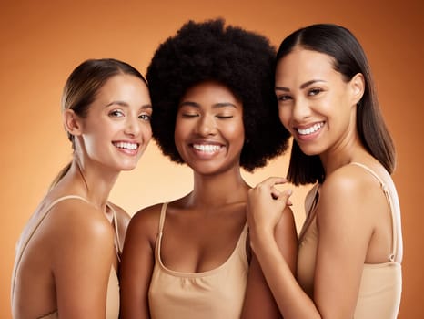 Diversity, women and skincare for beauty, being happy and makeup brown studio background together. Support, portrait and girls with smile, empowerment and natural beauty inclusion, proud or cosmetics.
