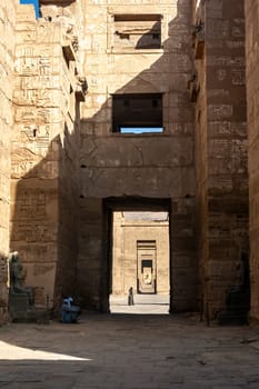 Luxor, Egypt - April 16 2008: The funerary temple of Ramses II in the archaeological site of Medinet Habu, Luxor, Egypt