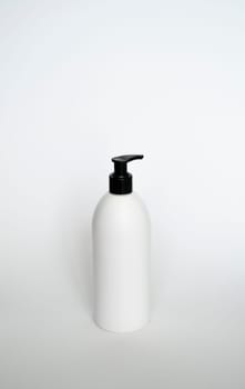 Liquid container for gel, lotion, cream, shampoo, bath foam. Cosmetic plastic bottle with black dispenser pump