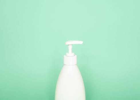 Blank unbranded cosmetic plastic bottle with dispenser pump for shampoo, gel, lotion, cream, bath foam