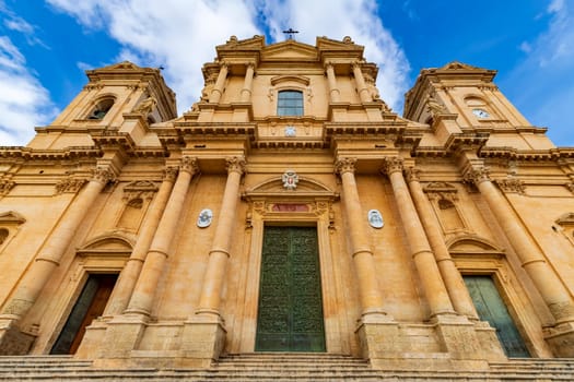 The facade of the Noto Cathedral is a masterpiece of the Sicilian Baroque and a significant landmark.