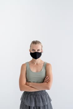 Healthcare concept. Young woman in a protective mask, portrait, close up. Copy space