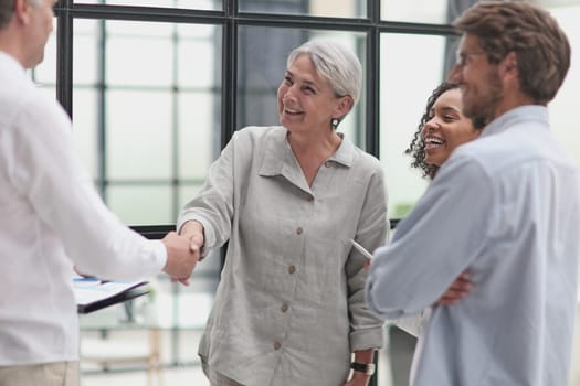 Conversation between managers and employees in the office.