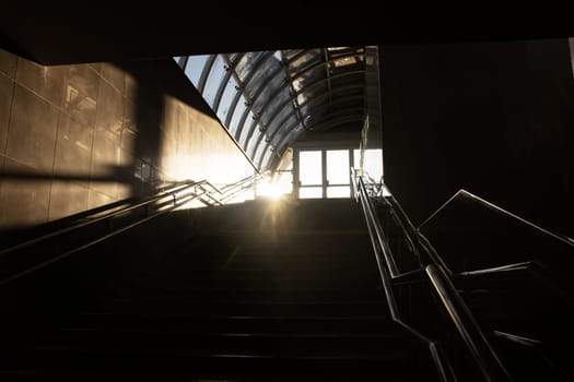 Sunlight on a dark staircase close up