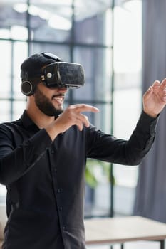 Businessman with virtual reality headset at office