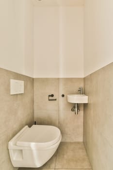 a white toilet in a small room with tile flooring and wall to the right, there is a mirror on the wall above