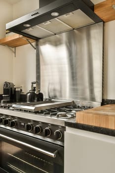 a kitchen with an oven, stove and dishwasher in the photo is taken from the front view window