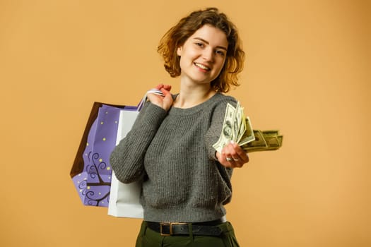 Portrait of happy beautiful shopaholic woman carry shopping bags, advertising concept isolated banner background.