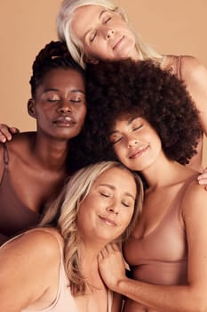 Women, natural beauty and diversity with eyes closed in studio for self love, wellness or healthy skincare, community or support. Different female group of models in underwear for body positive pride.