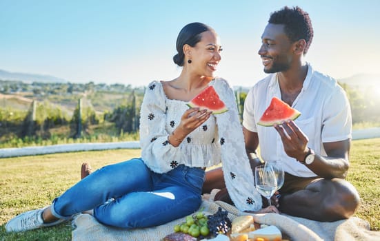 Watermelon, love or black couple on a picnic to relax on a summer holiday vacation in nature or grass. Partnership, romance or happy black woman enjoys traveling or bonding with a funny black man.