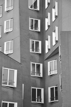 Interlocking clinker facade of the Gehry buildings at the Media Harbor in Dusseldorf, Germany