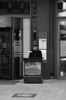 Porter in front of the luxury hotel Breidenbacher Hof in Duesseldorf, Germany