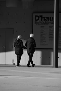 Couple of renters in front of the Dusseldorf D'haus Theater in Dusseldorf, Germany
