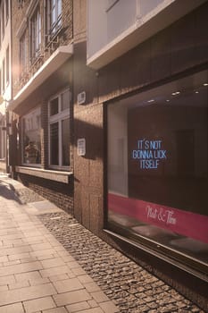 Ice cream shop in Duesseldorf, Germany with words It's not gonna lick itself