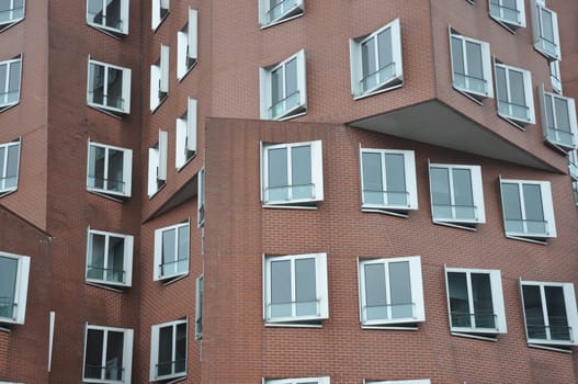 Interlocking clinker facade of the Gehry buildings at the Media Harbor in Dusseldorf, Germany