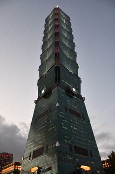 Vertical shot of Taipei 101 skyscraper in Taipei, Taiwan during dusk