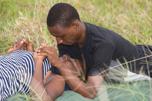 young loving couple on romantic moments.Couple kissing and having a good time together in the park. happy family relationship concept