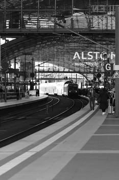 Vertical shot of a regional train RE entering Berlin main station in Berlin, Germany