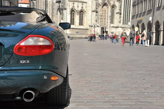 Green Jaguar XKR Convertible in the old town