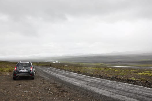 Grey Dacia Duster on one of Iceland's F-roads on a cloudy day