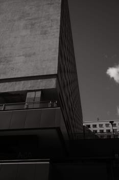 Vertical shot of brutalist buildings with concrete facades in Berlin, Germany