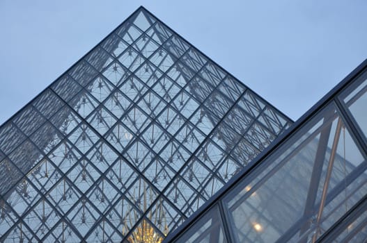 Close view of glass pyramid in the courtyard of the Louvre in Paris, France