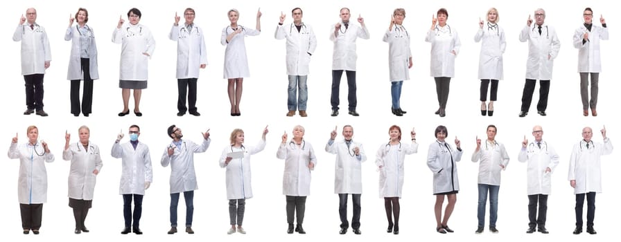 group of doctors in full length isolated on white background