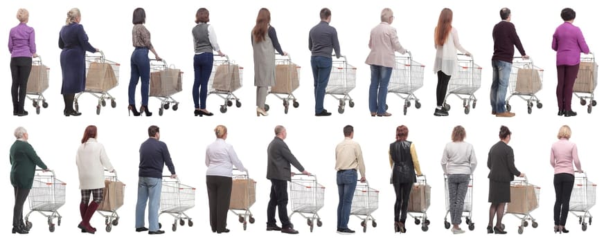 a group of people with a cart stand with their backs isolated on a white background