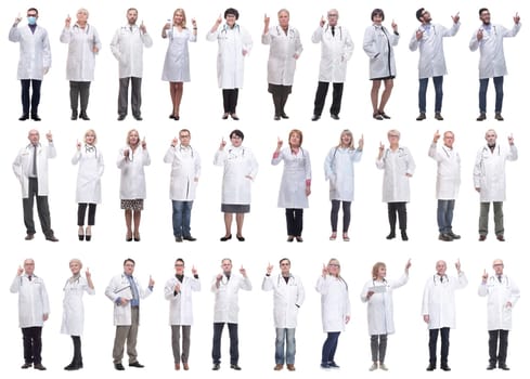 group of doctors in full length isolated on white background