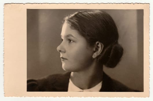 THE CZECHOSLOVAK REPUBLIC - DECEMBER 20, 1936: Vintage portrait of a young woman