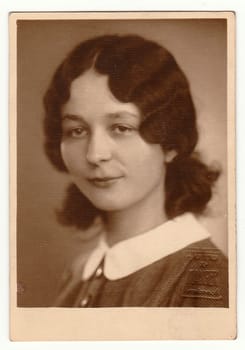 PRAGUE, THE CZECHOSLOVAK REPUBLIC - CIRCA 1940s: Vintage portrait of a woman