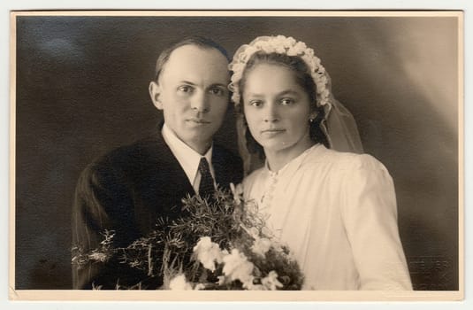 PRIBRAM, THE CZECHOSLOVAK REPUBLIC - CIRCA 1941: Vintage photo of newlyweds