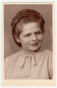 ZABREH NAD ODROU, THE CZECHOSLOVAK REPUBLIC - CIRCA 1940s: Vintage photo of a young woman