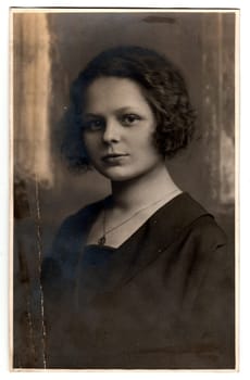 THE CZECHOSLOVAK REPUBLIC - CIRCA 1930s: Vintage photo of a young woman with mysterious look
