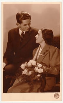 PRAGUE, THE CZECHOSLOVAK REPUBLIC - CIRCA 1940s: Vintage photo of newlyweds