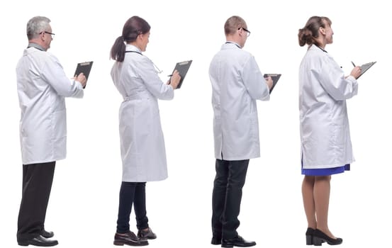 group of doctors standing with their backs isolated on white background