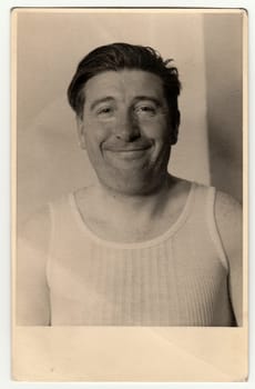 THE CZECHOSLOVAK SOCIALIST REPUBLIC - CIRCA 1950: Vintage photo of smiling man.