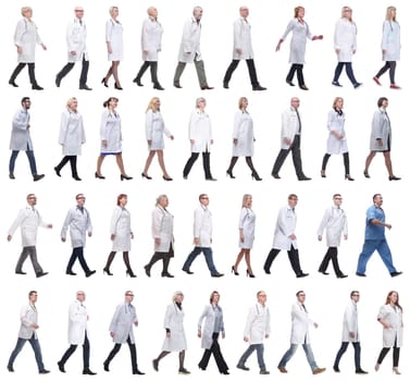 group of doctors in motion isolated on white background
