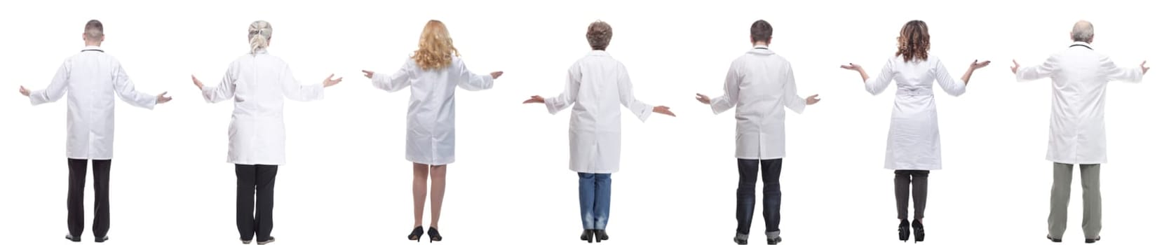 group of doctors standing with their backs isolated on white background