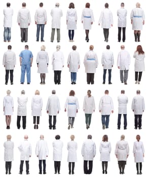 group of doctors in full length isolated on white background