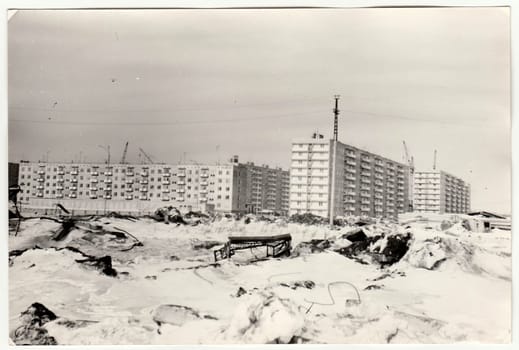 USSR - CIRCA 1970s: Vintage photo shows construction of blocks of flats in USSR. Winter time.