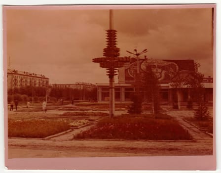 USSR - CIRCA 1970s: Vintage photo shows communistic monument and mosaic on background