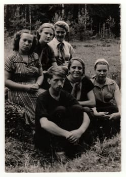 USSR - CIRCA 1980s: Vintage portrait shows people outdoors. Black & white photo.