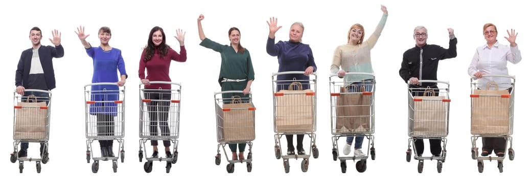 group of people with shopping cart showing thumbs up at camera isolated on white background