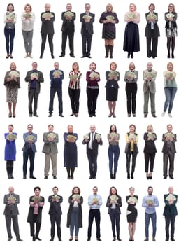 group of successful people with money in their hands looking at the camera on a white background