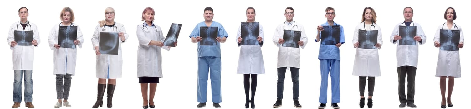 group of doctors holding x-ray isolated on white background
