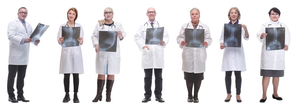 group of doctors holding x-ray isolated on white background
