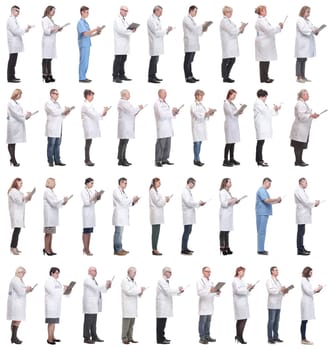 full length group of doctors with notepad isolated on white background